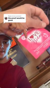A screenshot of teh Ashley Barnes drawer video. The screenshot shows inappropriate toys in a drawer next to a Mormon bible.