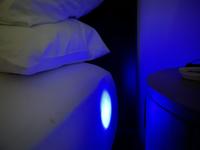 Marriott Hotel night stand LED aims at the bed