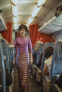 A flight attendant on board, 1966