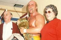 Hulk Hogan celebrating his first WWF title win with his parents, 1984