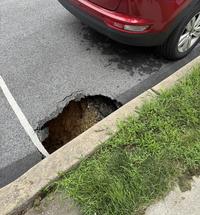 A sinkhole in the street