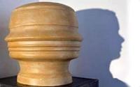 Custom urns that cast a silhouette of the person