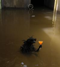 The panama alien. He has a drink.