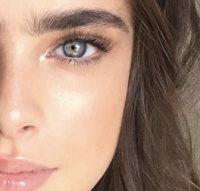 A photo of a woman from "Pinterest":https://knowyourmeme.com/memes/sites/pinterest seen with cowlick eyebrows.