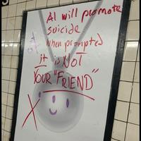 An example of the Friend AI NYC subway ad campaign being graffitied in early October 2025, shortly after it launched.