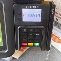 7-ELEVENⓇ 7-ELEVEN rk like to hildren $1 5 JKL▾ 7 PRS 8 TUV CANCEL CLEAR 3 DEF 6 MNO hang VXY AMERICA