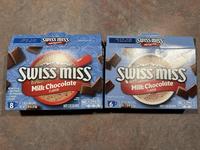 SZOZOTT A 13 LS: +1 80 561 COIZ SWISS MISS 99.9% caffeine free Milk Chocolate 1 9202 10 B1:00 60 £61+ 8012 SWISS MISS Milk Chocolate 99.9% caffeine free Swiss miss NO ARTIFICIAL: SWEETENERS ⚫PRESERVATIVES FLAVORS COLORS Milk Chocolate 8-1.38 07/ENVELOPES FLAVOR SWISS MISS Milk Chocolate FLAVOR NO ARTIFICIAL COLORS PER ENVELOPE 160 2 170mg 8 NET WT 21.04 02 (3130) HOT COCOA MIX 6-0.73-07 ENVELOPES 6 NET WT 4.38-02(1240) SUGGESTION PER ENVEL HOT COCOA MIX 90 2 150m 12 Sat Fat Sodio