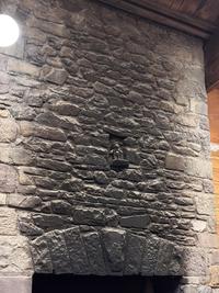 A bear covered in years of soot