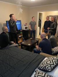 X user @distributedkv tweeted, "happy to host them all tonight," alongside a photo of several billionaire tech CEOs standing around a room talking.