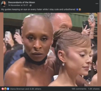 Facebook user Descendants of the Moon posted an image of Cynthia Erivo hugging Ariana Grande, writing, "My guides keeping an eye on every hater while I stay cute and unbothered 🧿"