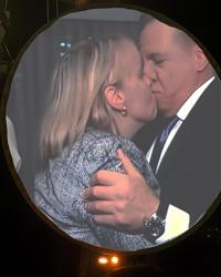 Prime minister François Legault kissing his sister