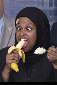 An edit of Nasrah Ahmed. It shows her crosseyed, eating bananas with rice.