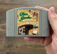 An image of a man holding an Olive Garden video game. The game does not exist.