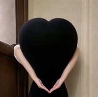 A photo of kykyky618 doing the heart butt challenge. She started the trend with this photo.