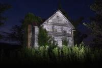 Abandoned house under the stars