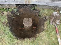 Replaced a fence post that had rotted through at the base, found the footing for it was poured direc...
