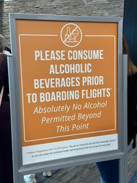 PLEASE CONSUME ALCOHOLIC BEVERAGES PRIOR TO BOARDING FLIGHTS Absolutely No Alcohol Permitted Beyond This Point **Federal Regulation FAR 121.575 states: "No person may drink any alcoholic beverages aboard an aircraft unless the certificate holder operating the aircraft has served that beverage"