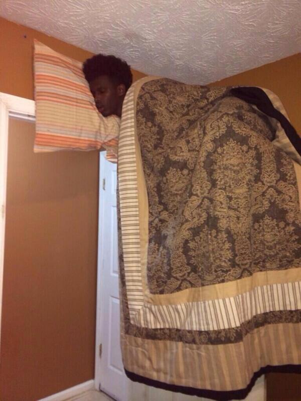 sleeping all cozy on top the the washer dryer in the bathroom for Selfie Olympics