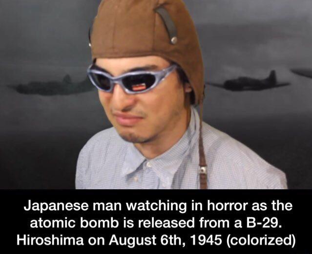 Japanese Man Watching In Horror As The Atomic Bomb Is Released From A B