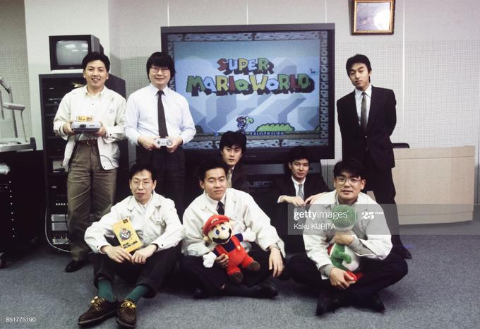 Standing, from left to right : Katsuya Eguchi, Toshioki Nakago, Toshio Iwawaki.

Sitting, from left to right : Takashi Tezuka, Hideki Konno, Kazuaki Morita, Shigehiro Kasamatsu, Shigefume Hino.