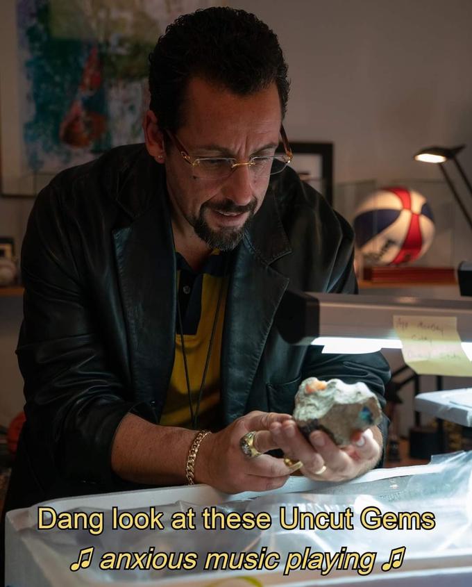 Dang look at these Uncut Gems A anxious music playing A