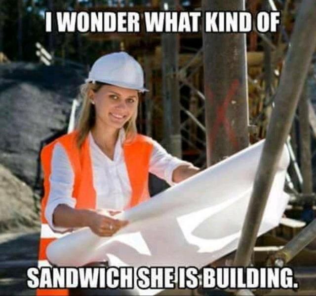 I WONDER WHAT KIND OF SANDWICH SHE IS BUILDING.