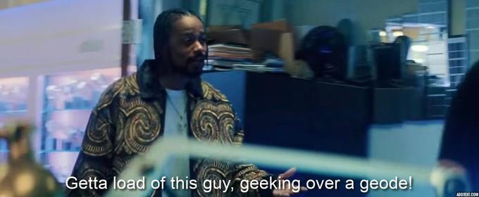 Getta load of this guy, geeking over a geode! ADDTEXT.COM