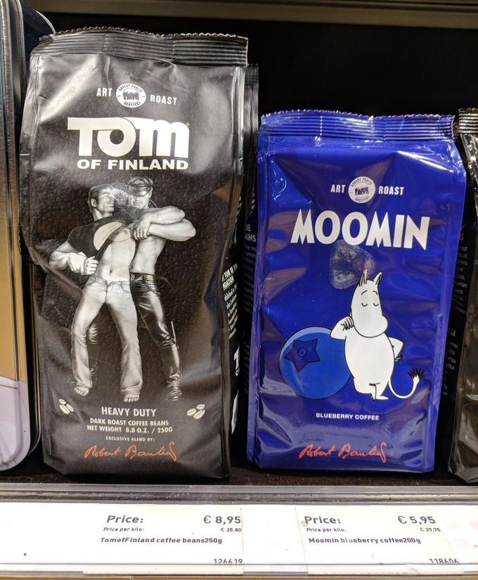 A PAR ART ROAST FOAST TOM OF FINL AND PAR LERT ART ROAST HE AINS MOOMIN he md artist 0s of TOM OF FY NDATION HEAVY DUTY DARK ROAST COFFEE BEANS NET WEIGHT 8.8 0.Z. / 250G BLUEBERRY COFFEE EXCLUSIVE BLEND BY: Aebent Baula Price: € 8,95 Price: €5,95 Price per kllo: € 35.80 Price per kllo: C 29,75 TomofFinland coffee beans250g Moomin blueberry coffee200g 126619 118606