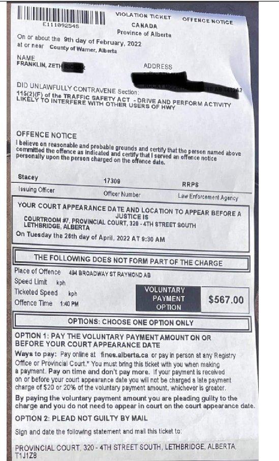 567.00 ticket for big ass flag obscuring license plate and vision from