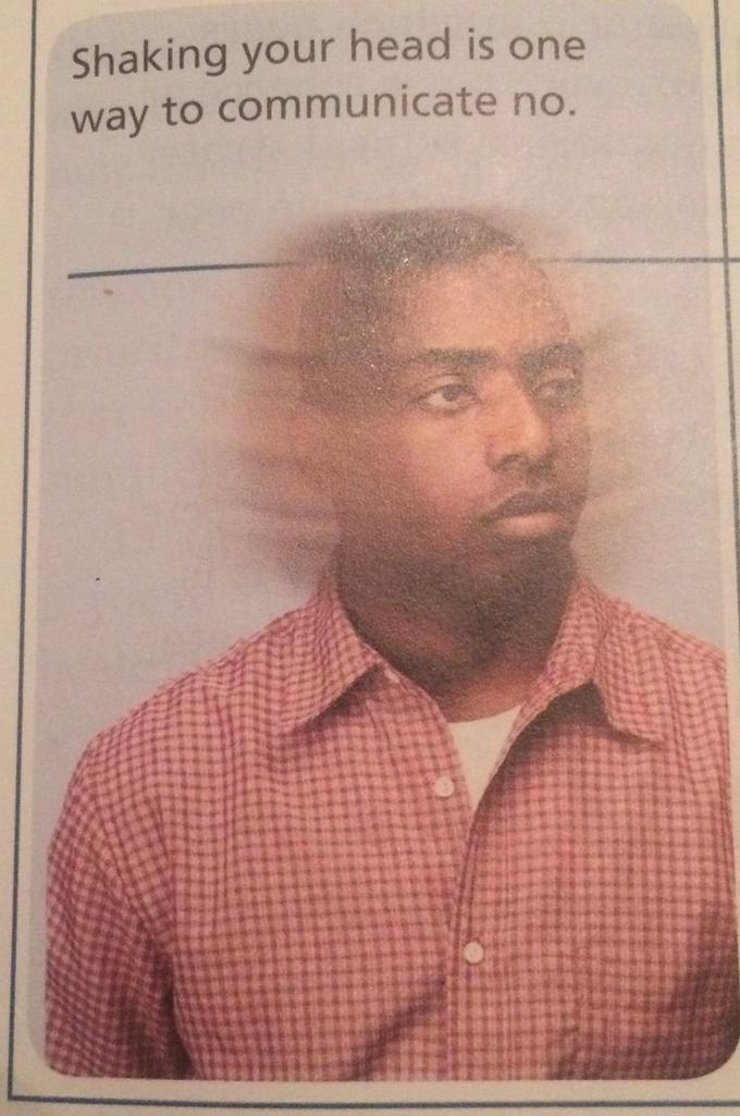 Shaking your head is one way to communicate no.