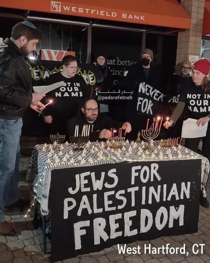 W WESTFIELD BANK W EA OT IN OUR NAME KLAU hat better incre OUT پـرفـتـنـه @pedarefetneh 40 NEVER A NOUR FOR IN NAME CAMENTE CO JEWS FOR PALESTINIAN FREEDOM West Hartford, CT