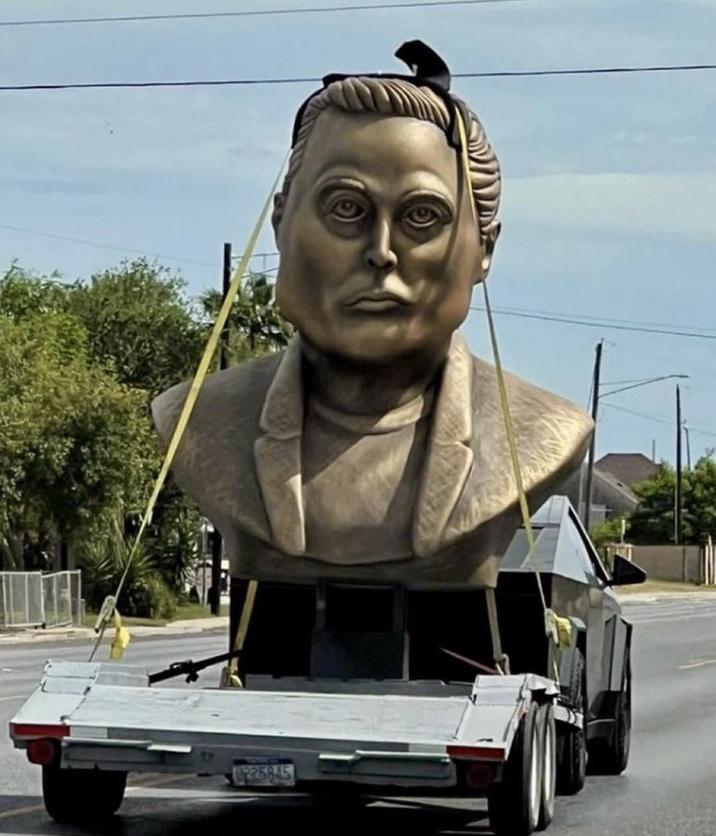 is now new meme statue ,Elon Musk   is not a compliment at all

A large bust of Elon Musk was photographed being moved by a Cybertruck in Brownsville, Texas.