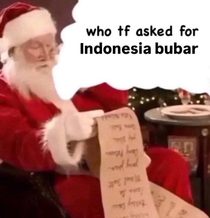 A meme showing Santa looking at his naughty and nice list. A thought bubble shows Santa thinking "who tf asked for Indonesia bubar."