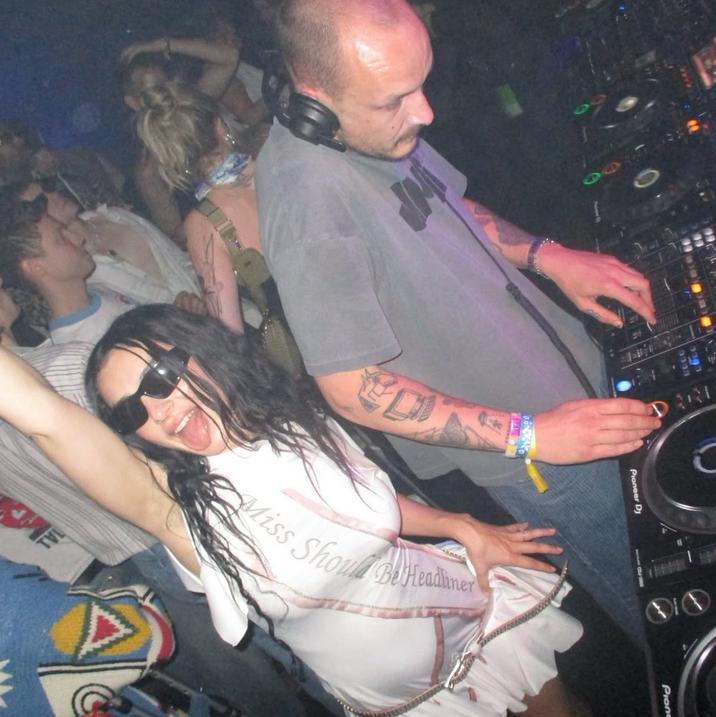 A photo of "British":https://knowyourmeme.com/memes/british-people-briish pop star Charli XCX wearing a  "Miss Should Be Headliner" sash at a Coachella afterparty where Green Day was the headliner.