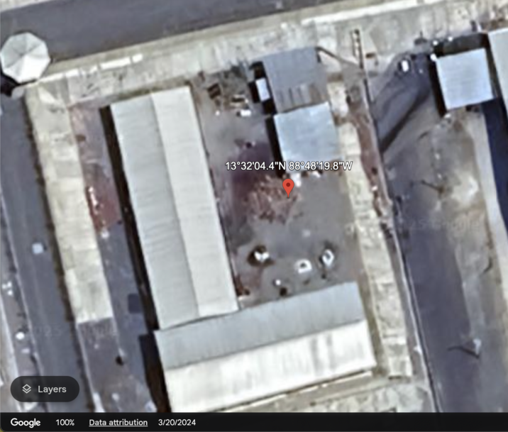 Google Earth satellite image of CECOT yard A screenshot of the Google Earth satellite view of a yard within the El Salvador CECOT facility. The image attributes the date to the image as May 20th, 2024.