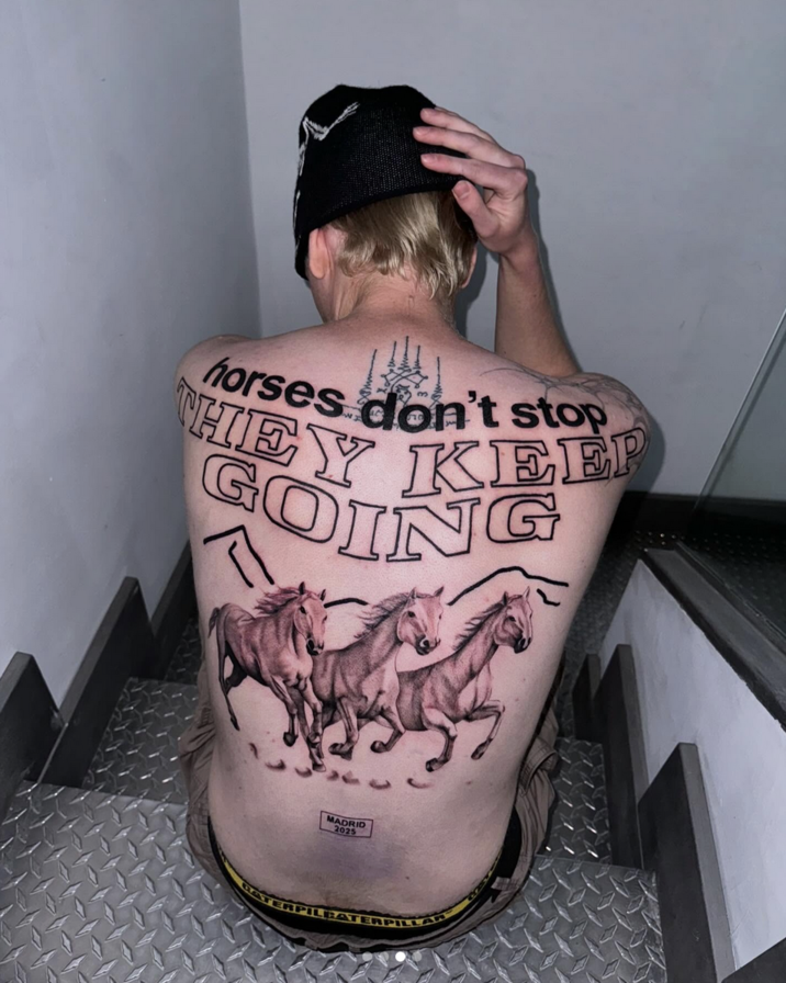 April 1st, 2025 tweet by @infrababy Madrid-based tattoo artist @Infrababy posted an Instagram slideshow of a full-back tattoo they did on a client. The tattoo read, "Horses don't stop, they keep going," alongside a tattoo rendition of galloping horses. The post gathered over 6,000 likes in two months.