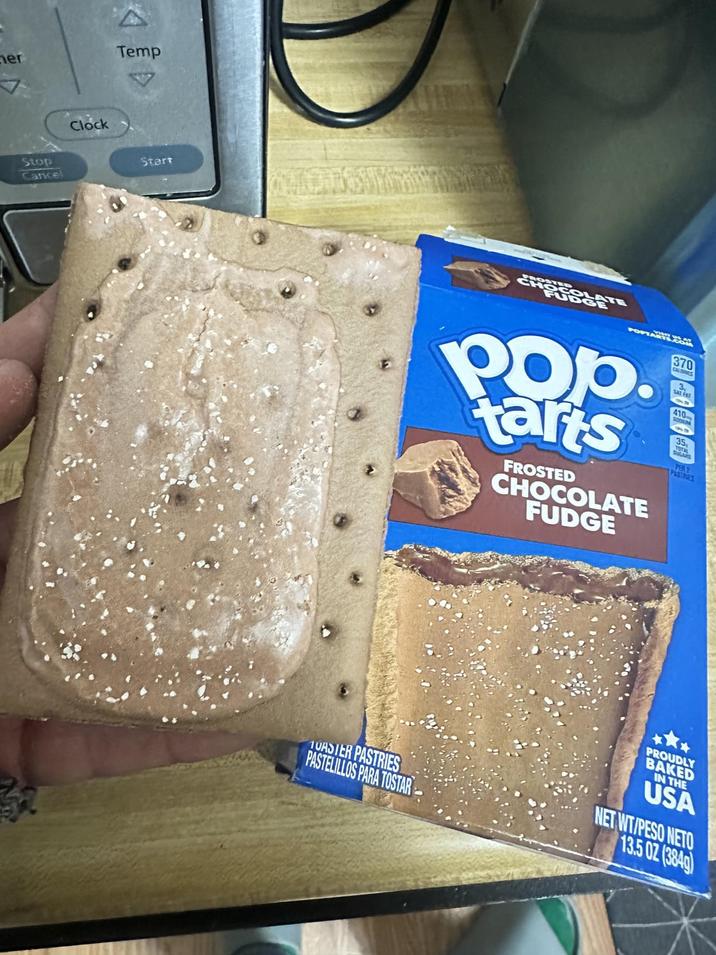 her Temp Stop Cancel Clock Start PORTAROM Pop. tarts FROSTED CHOCOLATE FUDGE 370 3 35 PER 2 PASTRIES TOASTER PASTRIES PASTELILLOS PARA TOSTAR PROUDLY BAKED IN THE USA NET WT/PESO NETO 13.5 02 (3849)