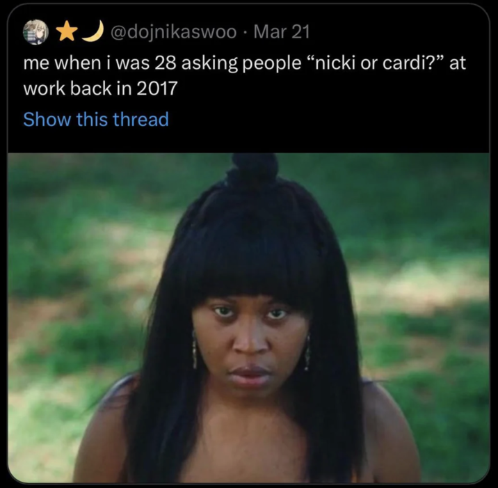 March 21st, 2023 tweet by @dojnikaswoo X user @dojnikaswoo was one of the first to use a still of Dre from the television show _Swarm_ to joke about herself being an obsessed fangirl. This tweet reads, "me when I was 27 asking people 'nicki or cardi?' at work back in 2017."