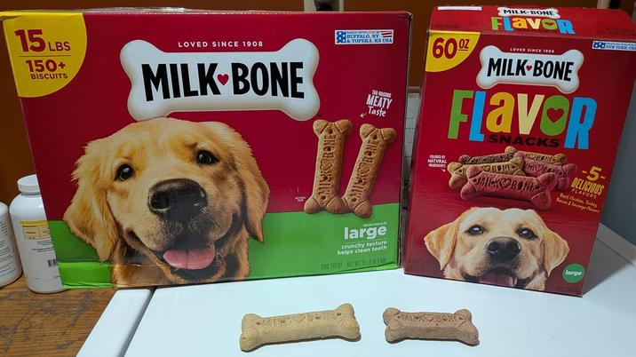 15LBS 150+ BISCUITS LOVED SINCE 1908 MILK BONE BAKED WITH LOVE IN BUFFALO, NY & TOPEKA, KS USA MEATY Taste SNACKS 600 MILK-BONE FlaveR COLORED BY NATURAL DENTS LOVED SINCE 1908 MILK BONE FlavoR SNACKS OBHBONE NEW YORK BENEB-5- MICKOBONE DELICIOUS FLAVORS Beef Chicken, Terkes Bacon &Savage Flavers large crunchy texture helps clean teeth DOG TREAT NET WT 15 LB (5.8 km) MICK BONE large