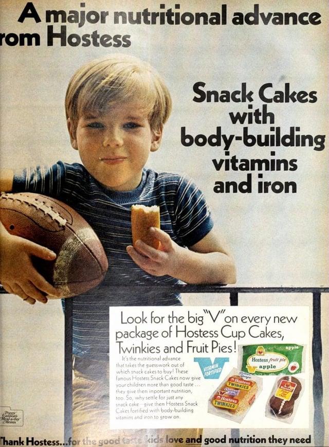 A major nutritional advance rom Hostess Snack Cakes with body-building vitamins and iron Look for the big "V"on every new package of Hostess Cup Cakes, Twinkies and Fruit Pies! It's the nutritional advance that takes the guesswork out of which snack cakes to buy! These Hostess TWINKIES VITAMIN famous Hostess Snack Cakes now give your children more than good taste... they give them important nutrition, too. So, why settle for just any FORTIFIED TWINKIES Hostess Hostess fruit ple apple Ponor Meal a day Menun snack cake give them Hostess Snack Cakes fortified with body-building vitamins and iron to grow on. Thank Hostess...for the good taste kids love and good nutrition they need