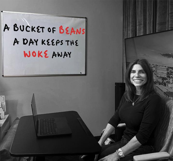 An edited photo of "U.S.":https://knowyourmeme.com/memes/cultures/united-states-of-america Congresswoman Nancy Mace, in which the whiteboard behind her says, "A bucket of beans a day keeps the "woke":https://knowyourmeme.com/memes/woke away."