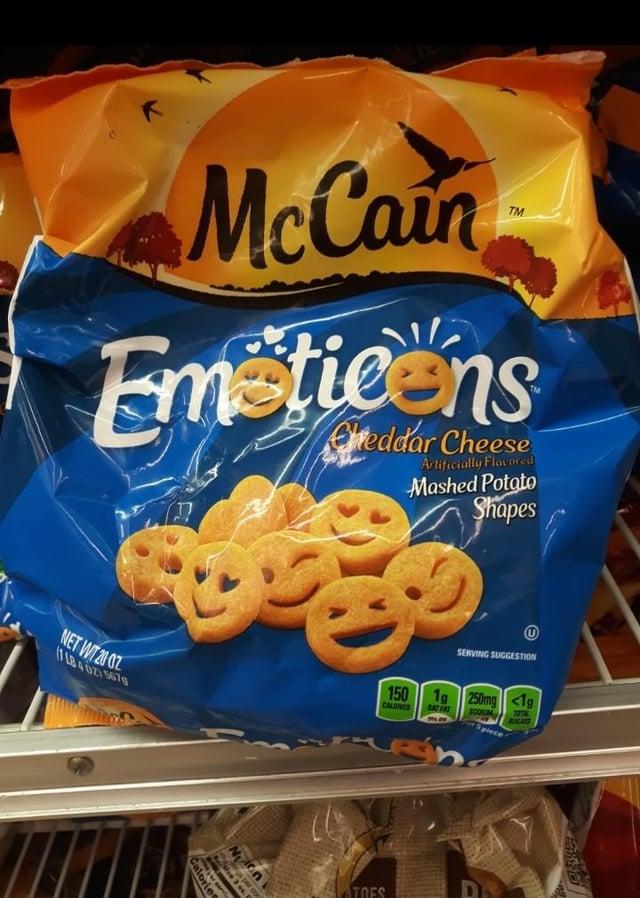 McCain TM Emoticons Cheddar Cheese Artificially Flavored Mashed Potato Shapes SERVING SUGGESTION 1g 250mg SCO piece <1g TOTAL SUGAST NET WT 2007 (11840215678 150 CALONES SAT FAT Calories à per con ATOES