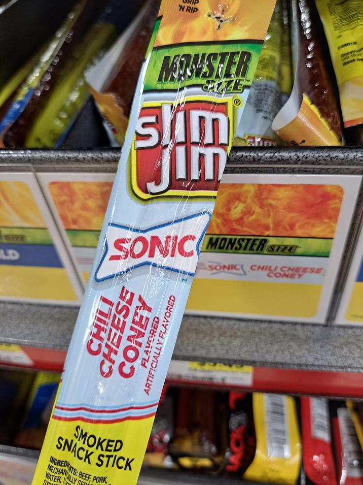 'N RIP MANUSHER ALE slim Jum Question call Mon sest by LD SONIC MONSTER SIZE CHILI CHEESE CONEY FLAVORED ARTIFICIALLY FLAVORED SMOKED SNACK STICK INGREDIENTS: B MECHANICALLY WATER, T SYOU BEEF, PORK SED SONIC CHILI CHEESE CONEY