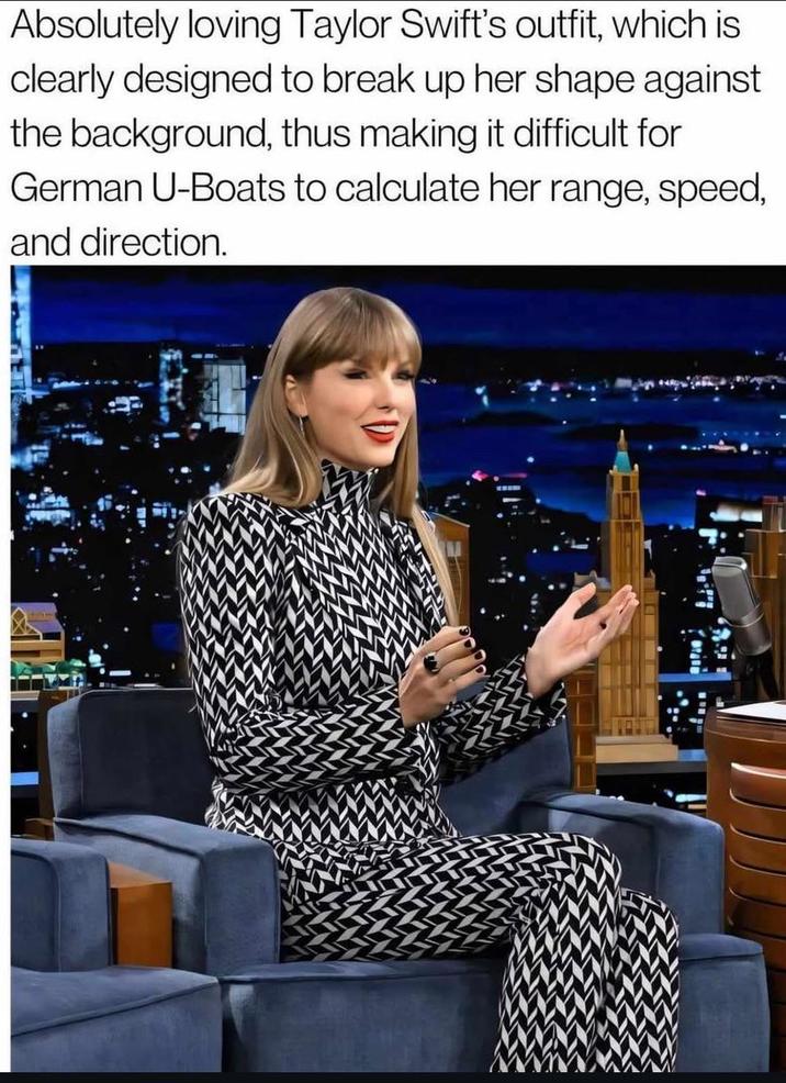 Absolutely loving Taylor Swift's outfit, which is clearly designed to break up her shape against the background, thus making it difficult for German U-Boats to calculate her range, speed, and direction.