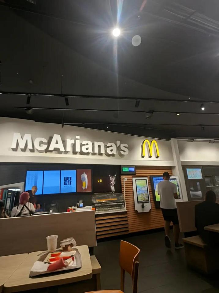 A photo of a business called "McAriana's," which resembles the name of the American popstar "Ariana Grande":https://knowyourmeme.com/memes/people/ariana-grande. The post was a part of a mid-2025 "TikTok":https://knowyourmeme.com/memes/sites/tiktok trend.