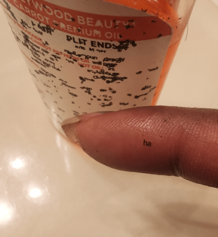 CARROT PREMIUM OIL WOOD BEAUTY EAKAGE A CARROT PLIT ENDS ers M ner will NOT OIL ha