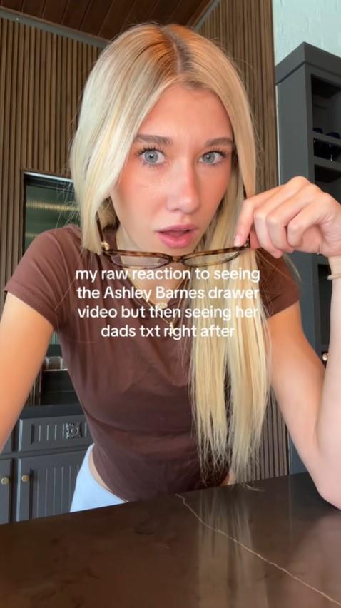 A TikTok video about the Ashley Barnes drawer video. The TikToker reacts in shock after seeing the video.