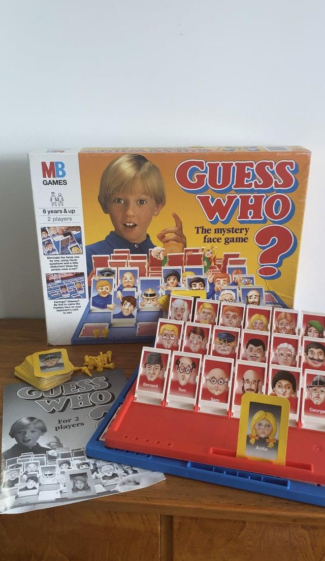 MB GAMES ww 6 years & up 2 players minate the faces one GUESS WHO The mystery face game ? ESS HO For 2 players Bernard toor Tom Sam Anita Georger
