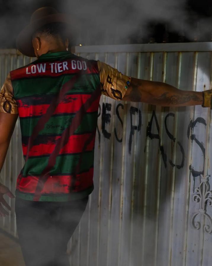 Fit Pic #6 A photo of streamer "Low Tier God":https://knowyourmeme.com/memes/people/low-tier-god, also known as LTG or Dale Wilson, wearing an outfit inspired by the character "Freddy Krueger":https://knowyourmeme.com/memes/smoking-freddy-krueger from the _A Nightmare on Elm Street_ horror film franchise.