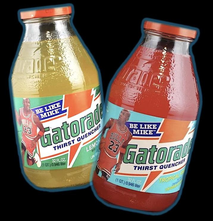 QUENCHER: CTARE T 23 BE LIKE MIKE Gatorad THIRST QUENCHER 32 FL.OZ 1QT.) 0.946 liter LEMON WITH LOW S rade WENCHER BULLS 23 BE LIKE MIKE" Gatora THIRST QUENCHER (1 QT.) 0.946 liter 32 FL.OZ TROPICAL